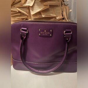 Plum Kate spade purse and wallets